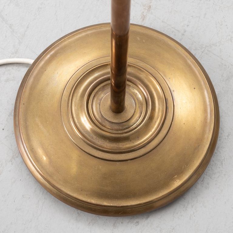 A brass floor lamp, Sweden, mid 20th century.
