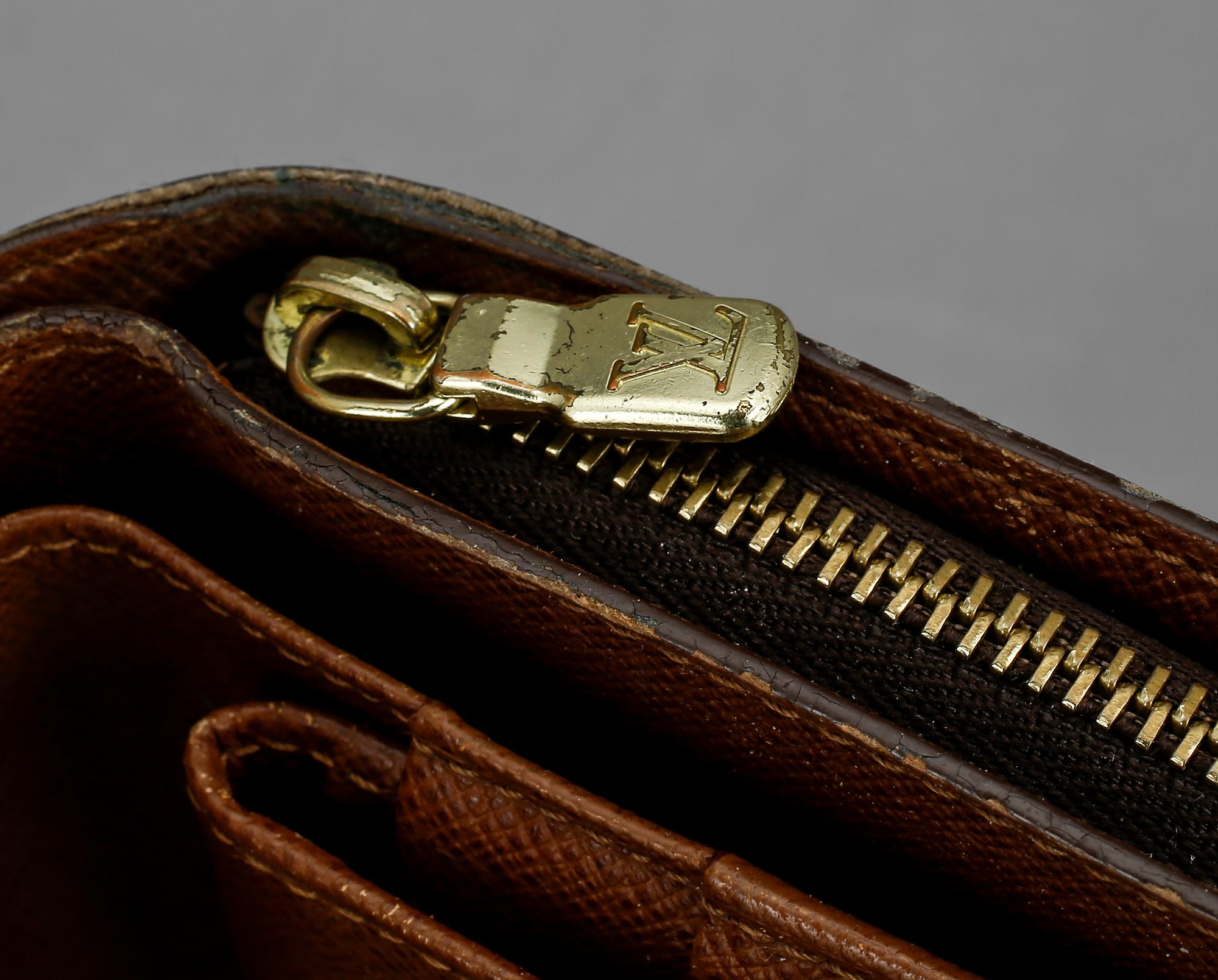 PLÅNBOK, "Compact zippy", Louis Vuitton.