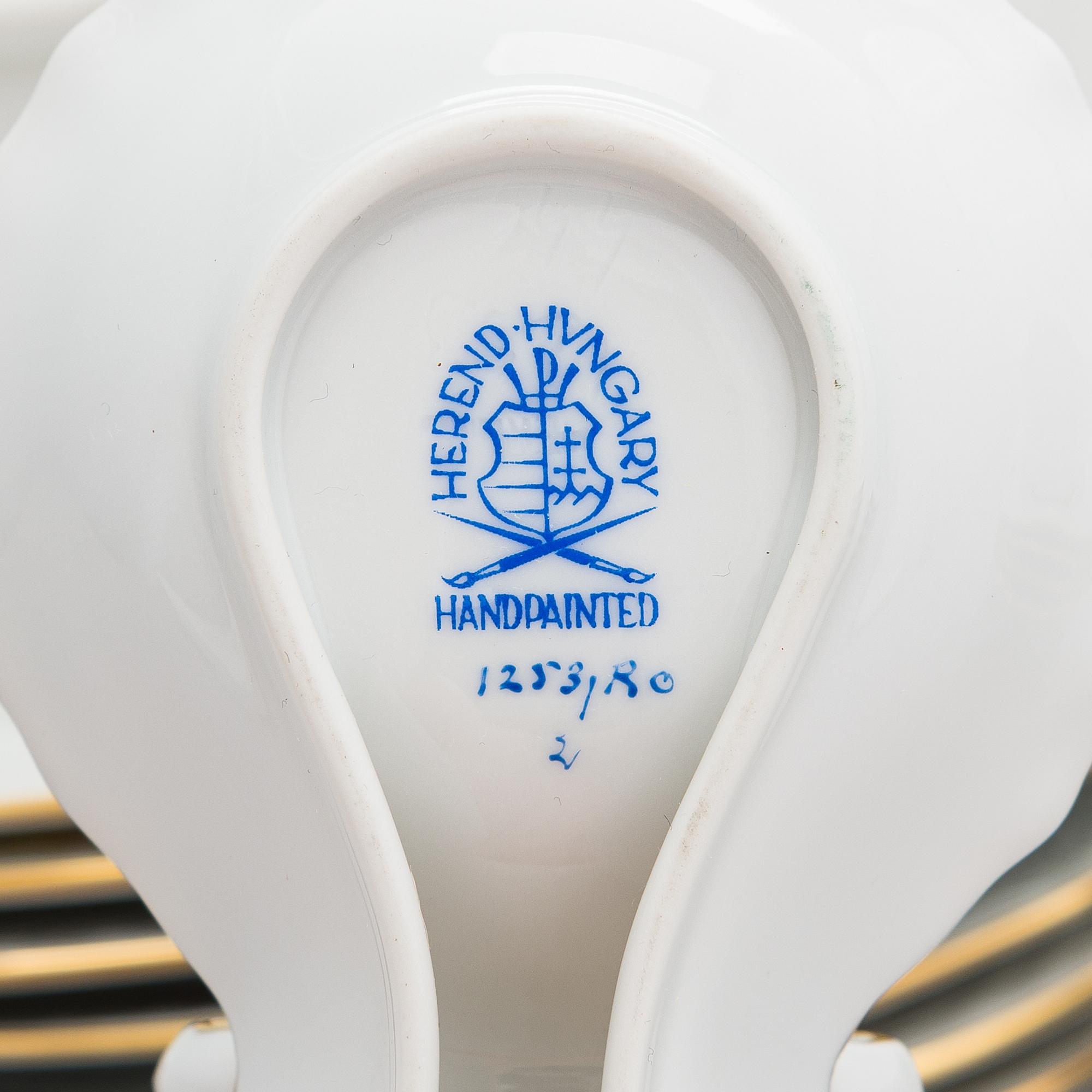 A 14-piece set of Herend 'Rotchild Bird' porcelain tableware, Hungary 1970s-1980s.