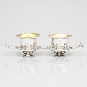 A pair of Swedish candy bowls with stand, parcel-gilt silver, mark of Gustaf Möllenborg, Stockholm 1851.