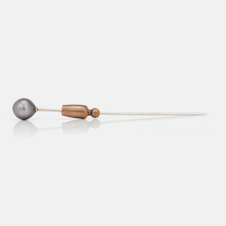 A probably natural saltwater pearl pin.