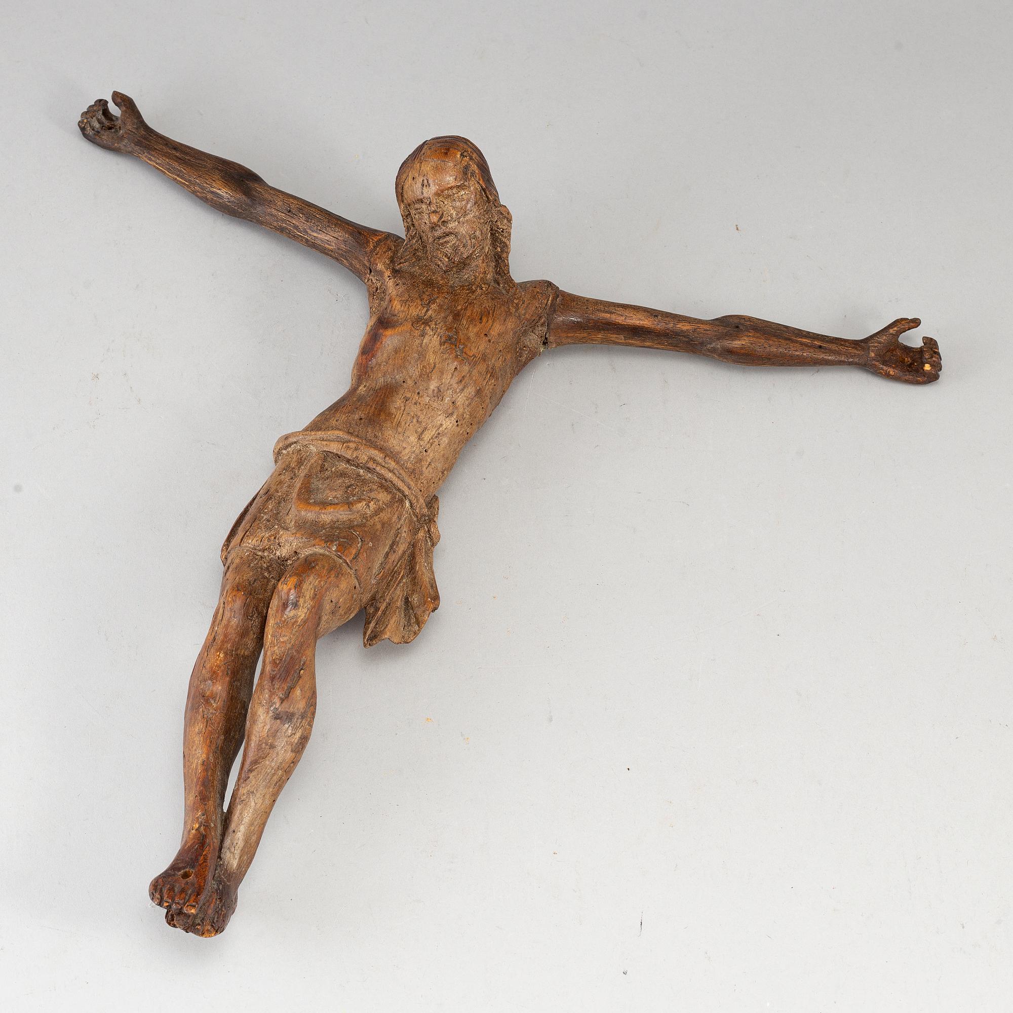 A carved wood crucifix, 18th/19th century.