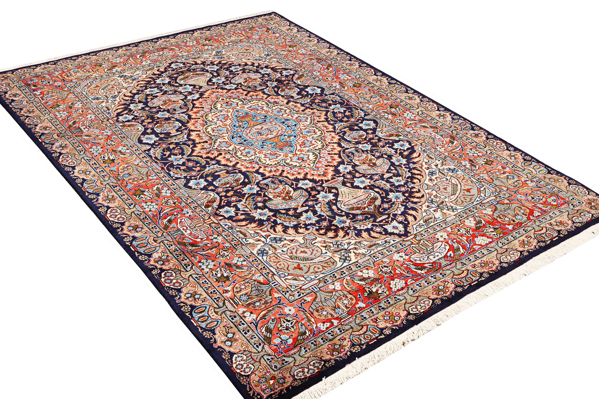 A Kashmar carpet, c. 310 x 203 cm.
