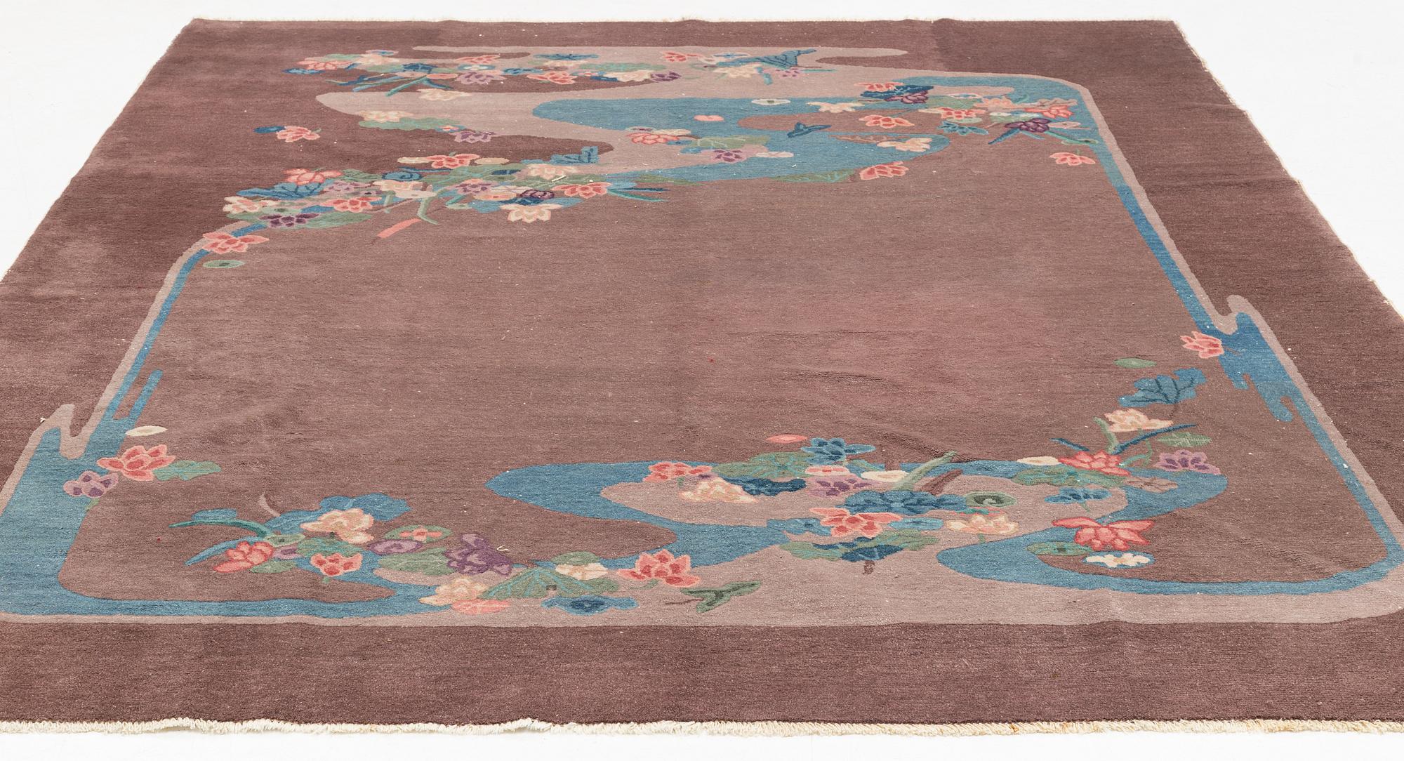 An antique/semi-antique Chinese carpet, c. 292 x 248 cm.