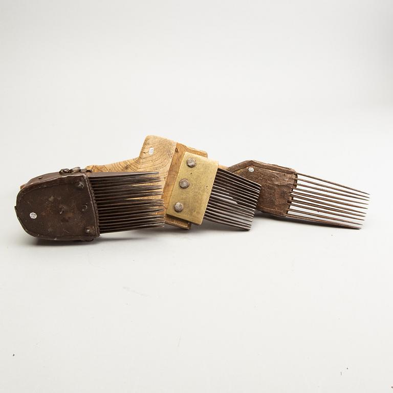 A set of 3 Persian carpet weavers combs and a wood printing block, 20th Century.