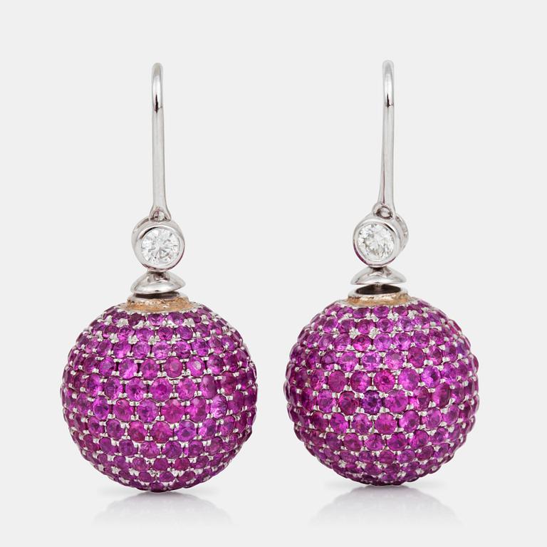 A pair of pink sapphire, diamond and cultured pearl earrings that can be worn in two different ways.
