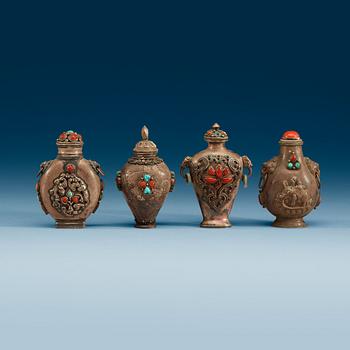 1569. A set of four Tibetan snuff bottles with stoppers, ca 1900.