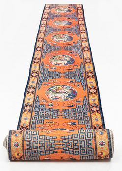 An antique Ningxia runner, north west China, c 763 x 72 cm.