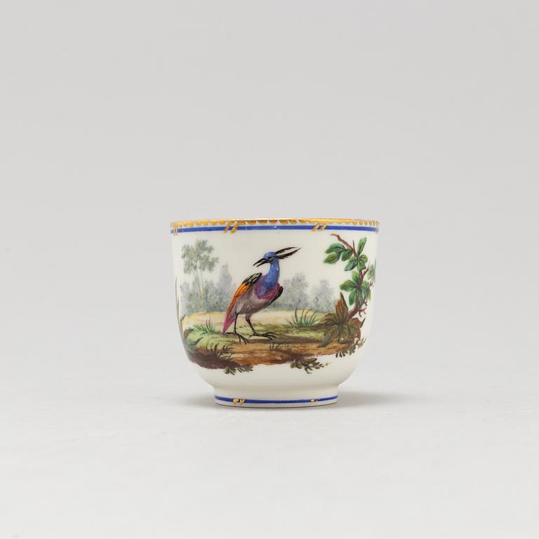 A pair of cups and saucers, "Sévrès"like mark, 19th century.