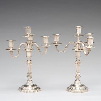A pair of French 20th century silver 950/1000 four light candelabra, marked Mon Odiot.