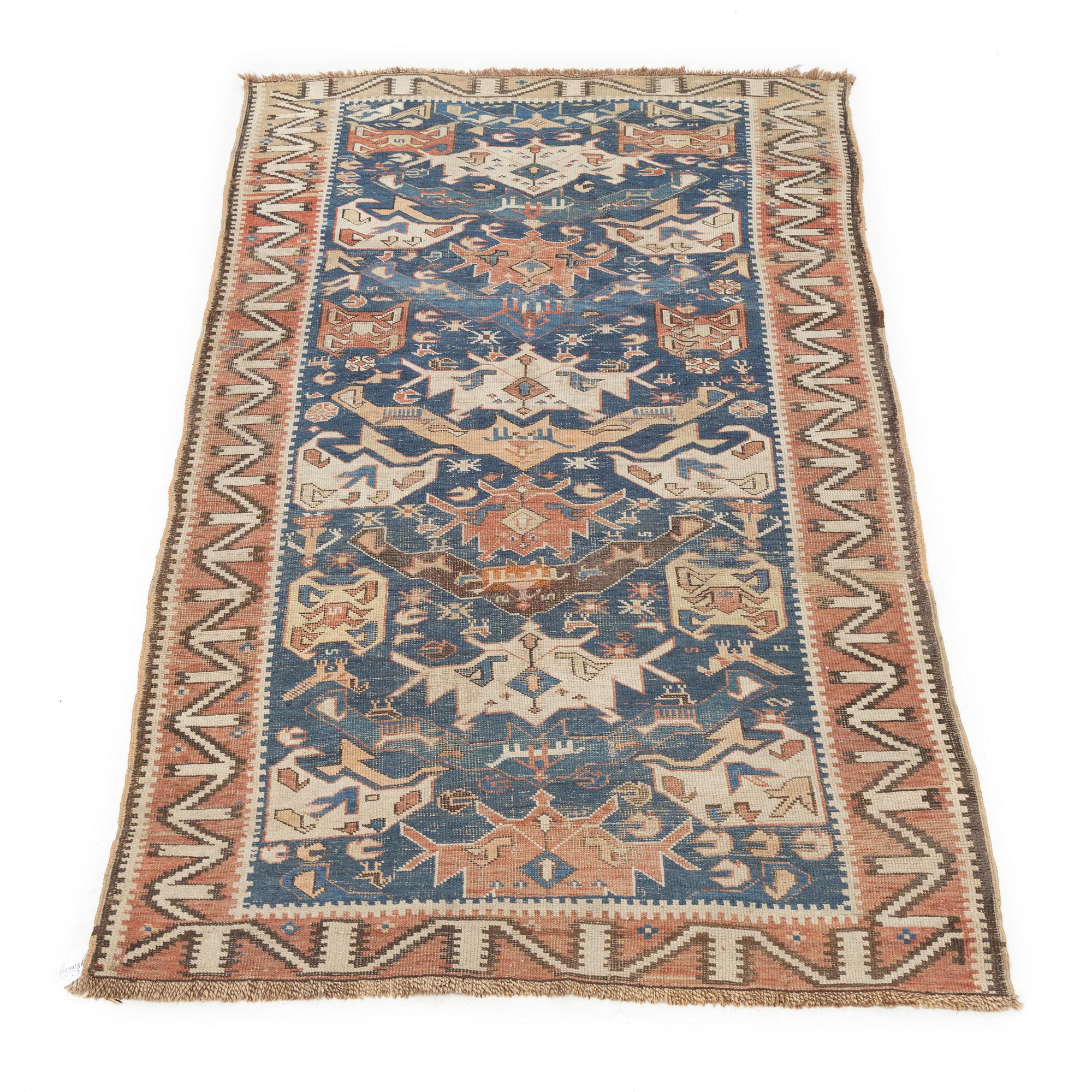 An oriental rug, c. 200 x 115 cm.