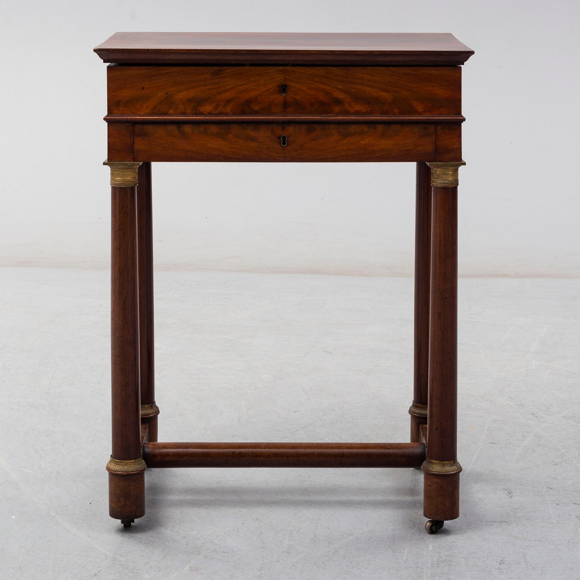 A mid 19th century sewing table.