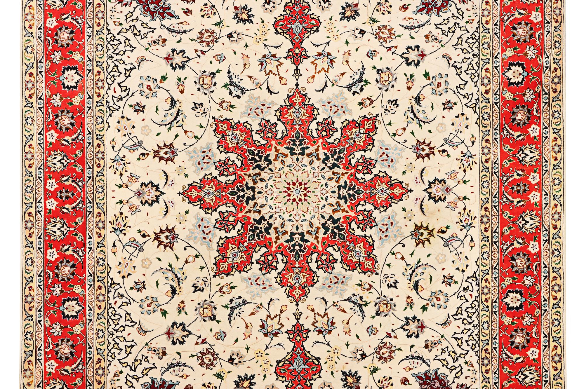 A Tabriz, part silk carpet, c. 300 x 199 cm.
