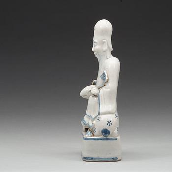 A blue and white figurine of a Chinese Immortal sitting on his deer, Ming dynasty (1368-1644).