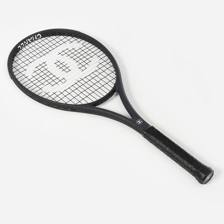 Chanel, tennis racket and 4 balls with case.