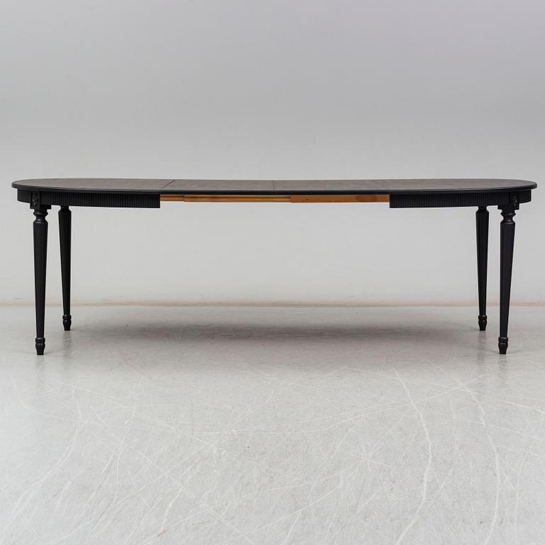 A second half of the 20th century Gustavian style dining table.