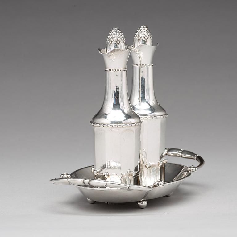 Georg Jensen, an 830/1000 silver cruet-stand, Copenhagen 1920. design nr 255.