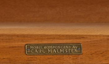 SKRIVBORD och KARMSTOL. "Nya Guldheden", brickmärkt Carl Malmsten.