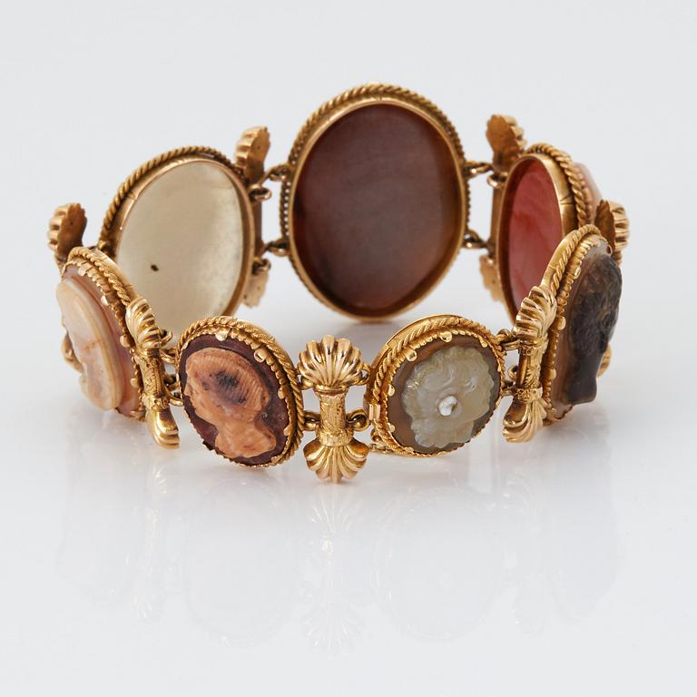 A BRACELET set with seven hardstone cameos.