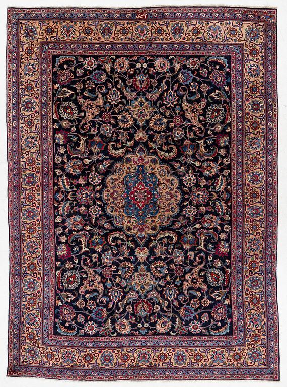 A Persian carpet, signed, c. 339 x 247 cm.