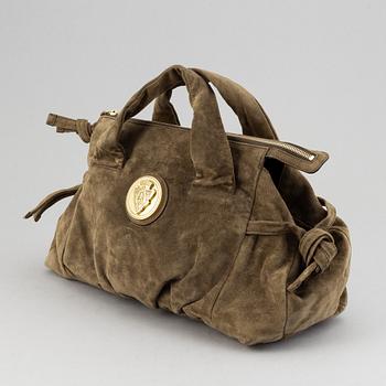Gucci, a suede bag.
