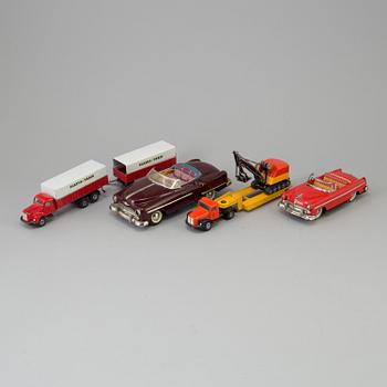 Four toy cars by Tekno and Haji, Germany and Japan.
