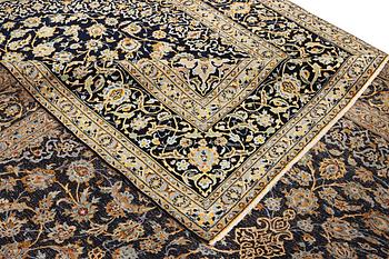 A Keshan carpet, c. 422 x 306 cm.