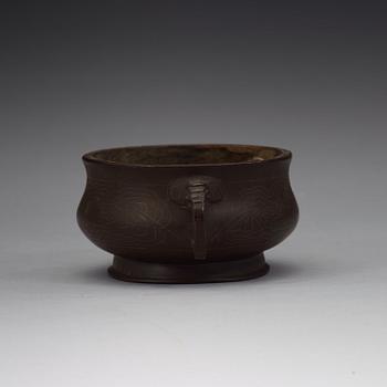 A bronze censer, Qing dynasty, circa 1900.