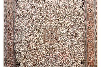 A carpet, silk Kashmir, c. 358 x 252 cm.