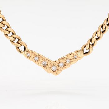 A 14K gold necklace with diamonds ca. 0.46 ct in total. With certificate.