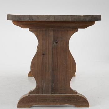 A solid pine dining table, 20th century.