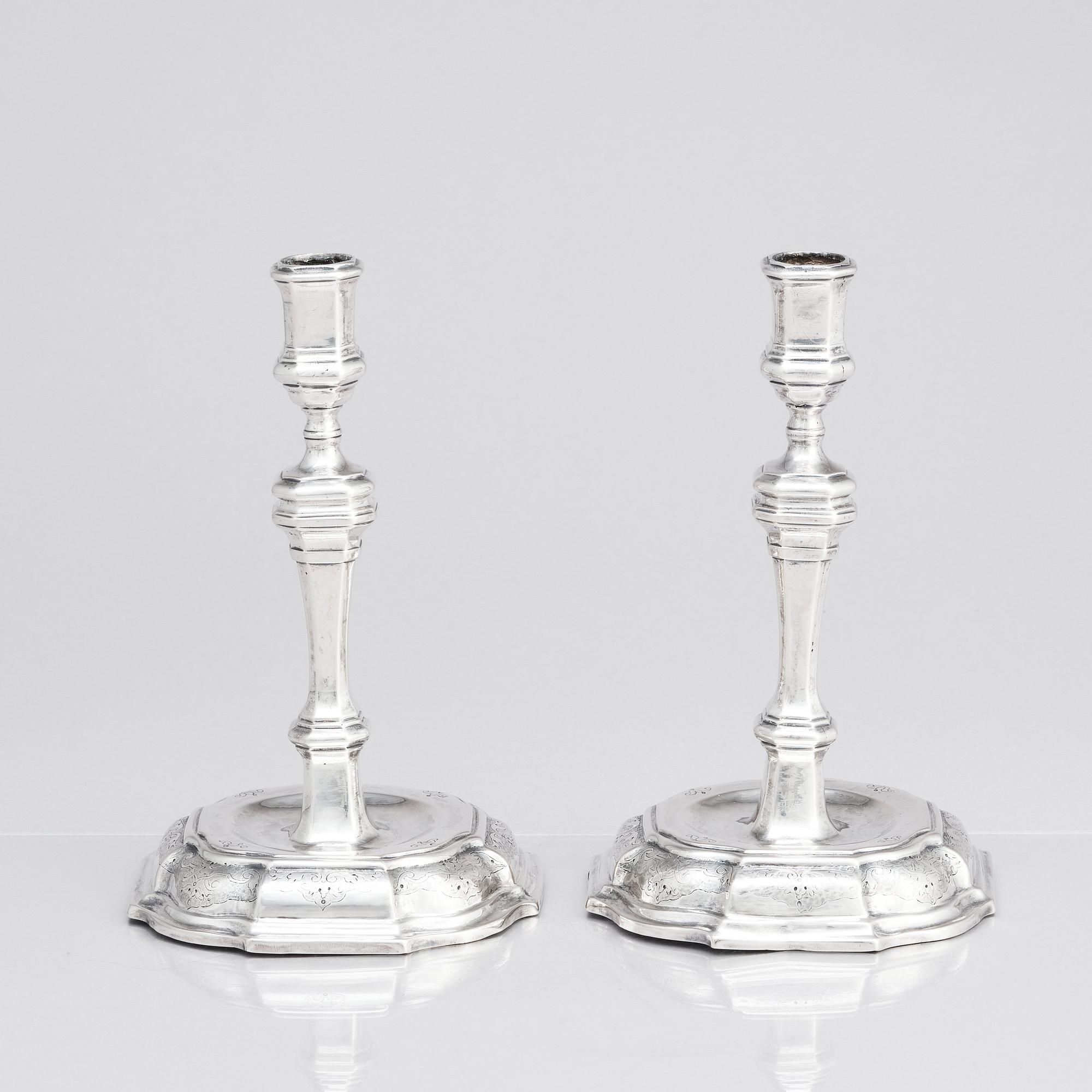 A pair of Swedish early 18th century silver candlesticks, mark of Petter Ersson Lund, Stockholm 1727.