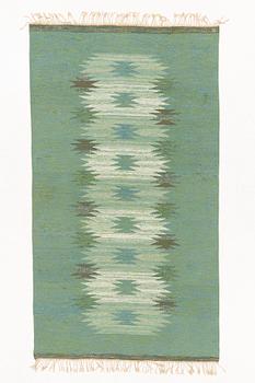 Magnhild Lundsten, a flat weave rug, signed ML, c. 270 x 150 cm.