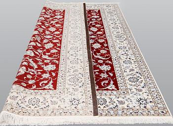 A Nain part silk carpet, 302 x 204 cm.