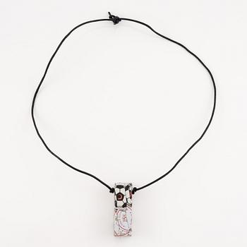 César Baldaccini, compression, pendant made of compressed beer bottle caps.