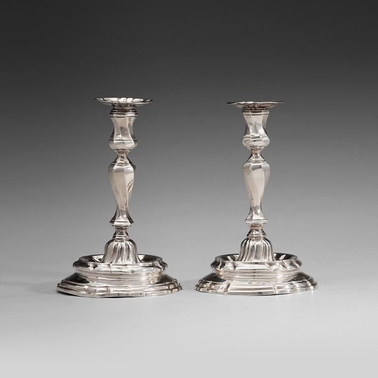 A pair of Swedish mid 18th century silver candlesticks, marks of Petter Åkerman, Stockholm 1756.