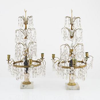 A pair of late Gustavian style girandoles, from around the year 1900.