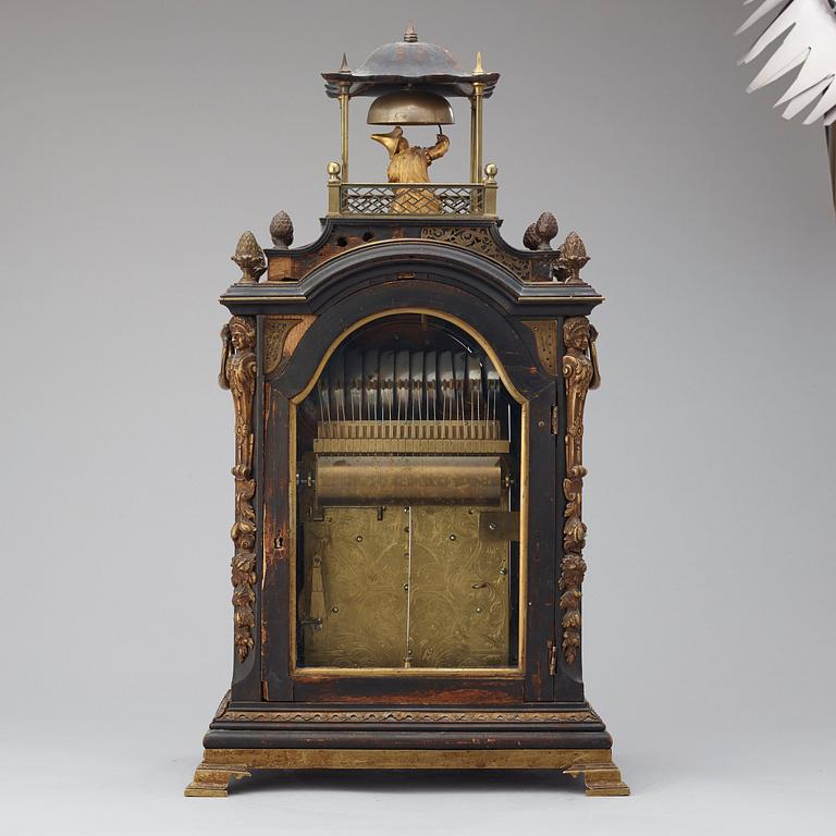 A George III ebonised and brass-mounted striking and musical automaton table clock, Stephen Rimbault, London, 1744-85.