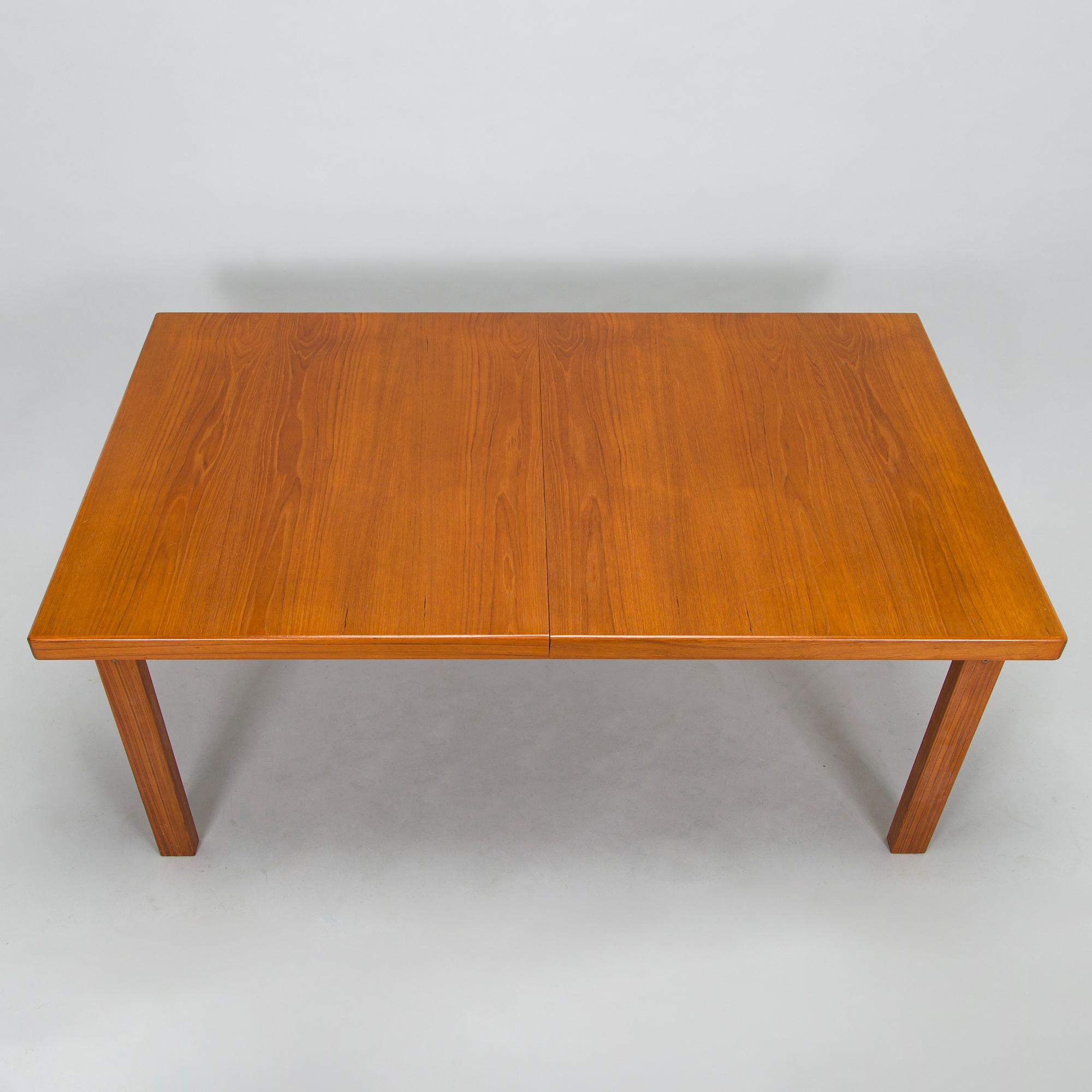 A mid-20th century dining table.