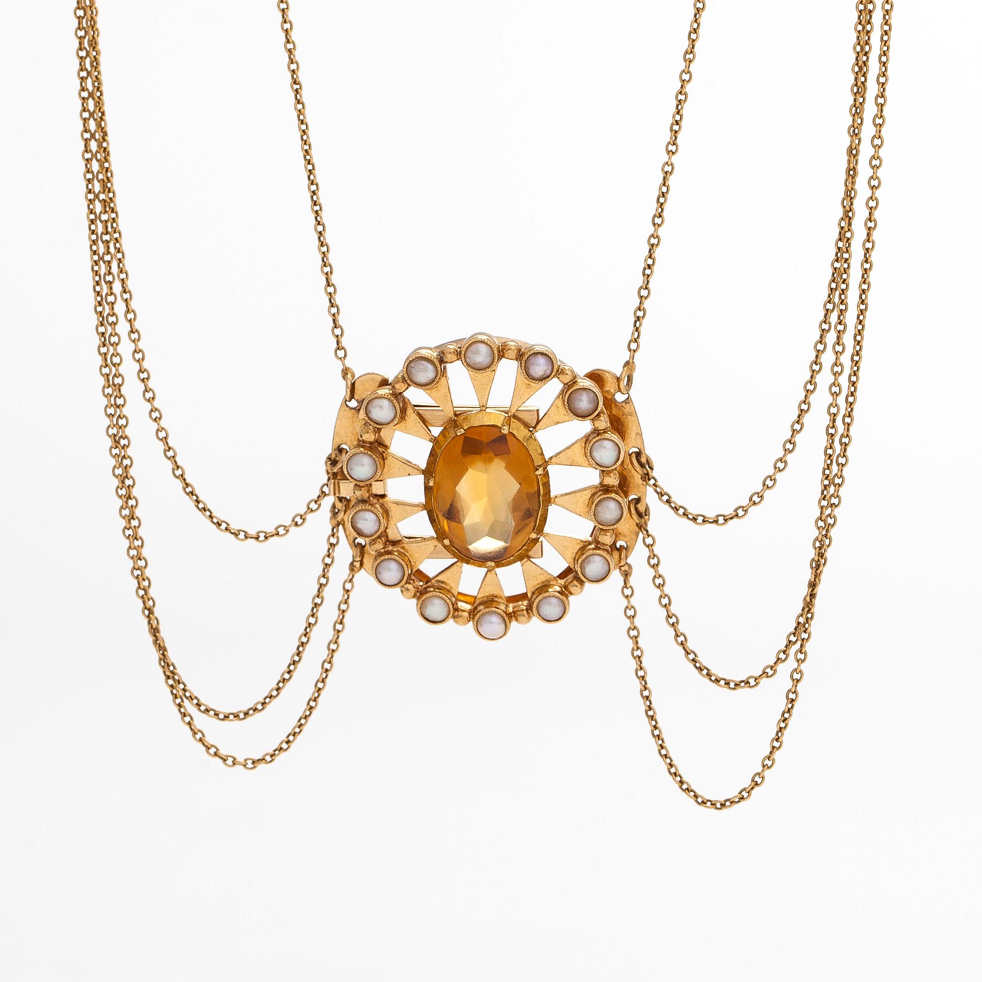 An 18K gold necklace, clasp with a citrine and pearls, Swedish hallmarks 1920.