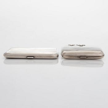 Two silver cigarette cases, J. H. Werner, Berlin, 1922, and Huguenin Frères, Switzerland before 1933.