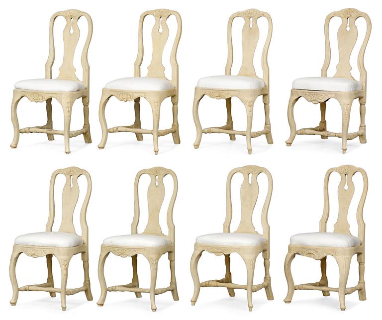 Eight matched Swedish Rococo chairs.