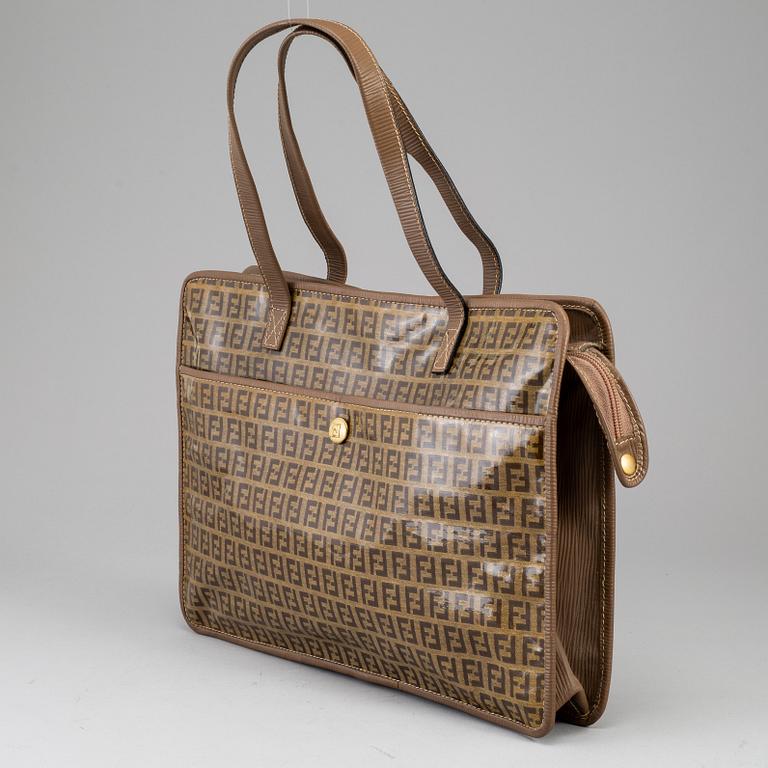 FENDI, a textile handbag.