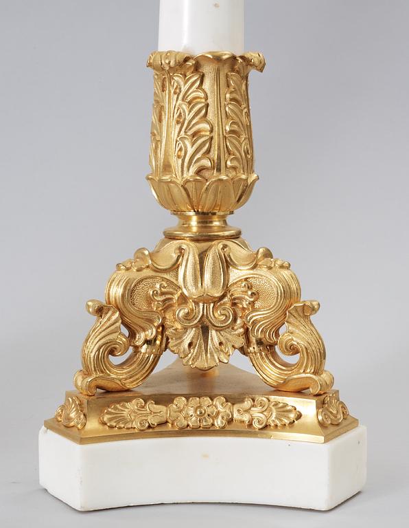 A pair of Empire-style circa 1900 seven-light candelabra.