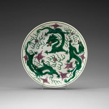 A green dragon dish, China, early 20th Century.