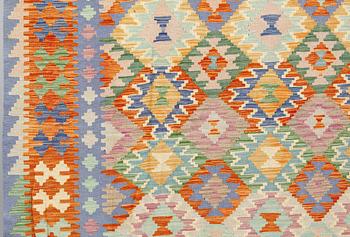 A Kilim carpet, approx. 393 x 296 cm.