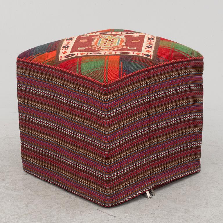 A footstool, kelim, contemporary.