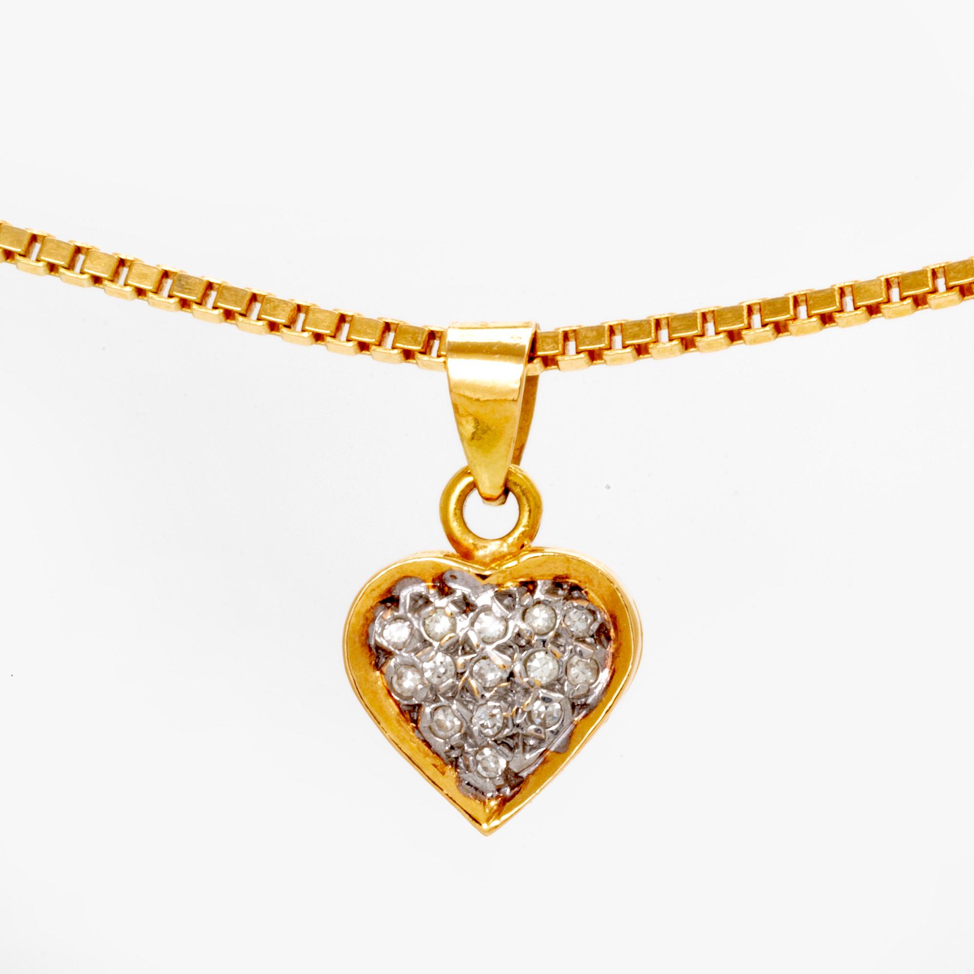 An 18K gold necklace with octagonal cut diamonds.
