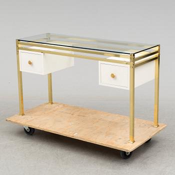A 1980's dressing table with glasstop.