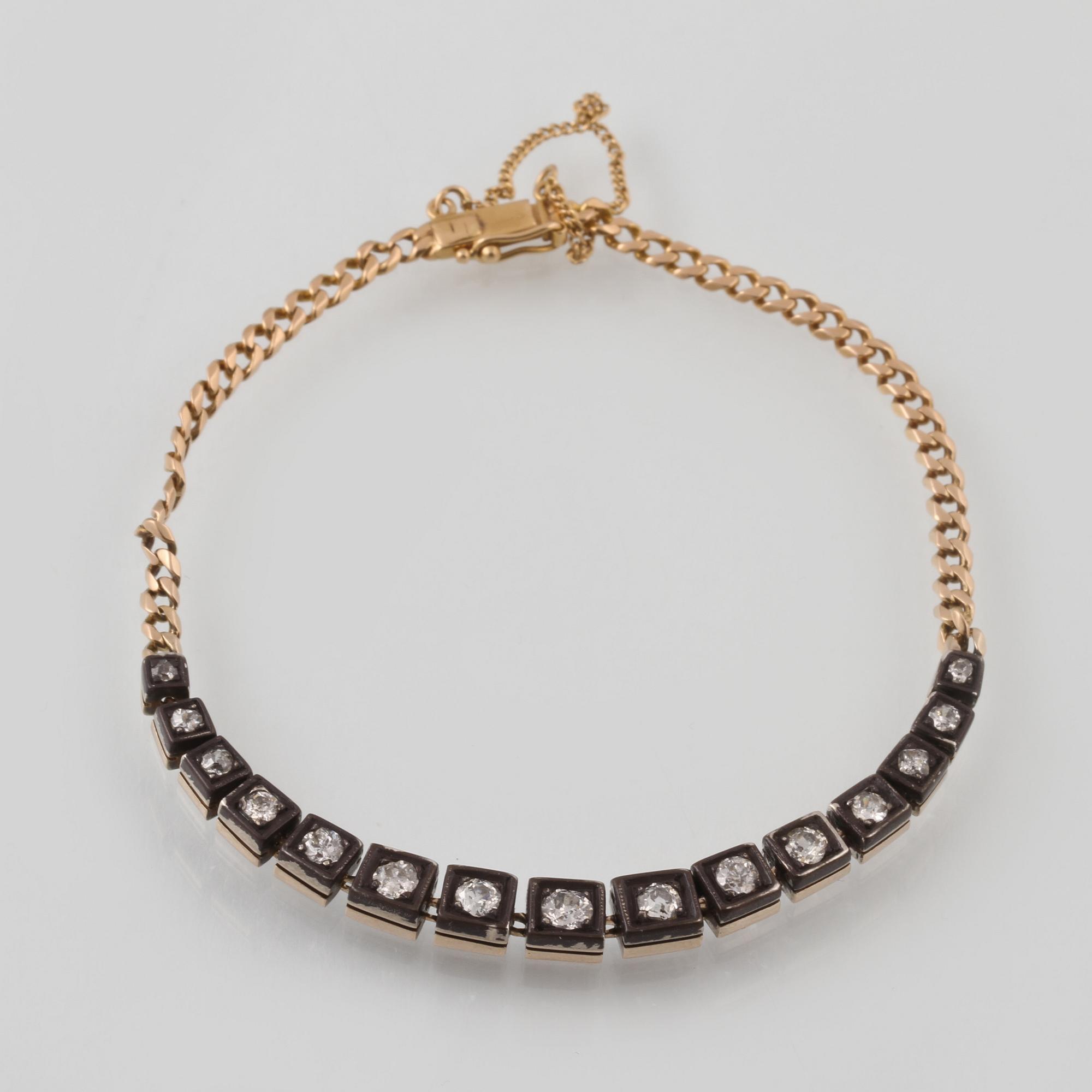 ARMBAND, 18K guld och silver med 15 gammalslipade diamanter, importstämplat. Vikt 7,2 gram.